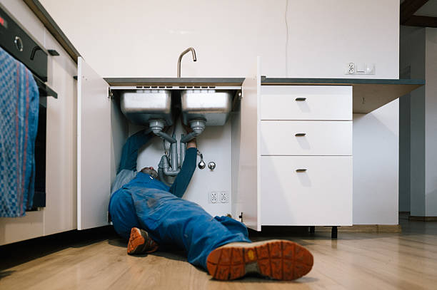 Professional Emergency Plumber technician working in Matthews, IN